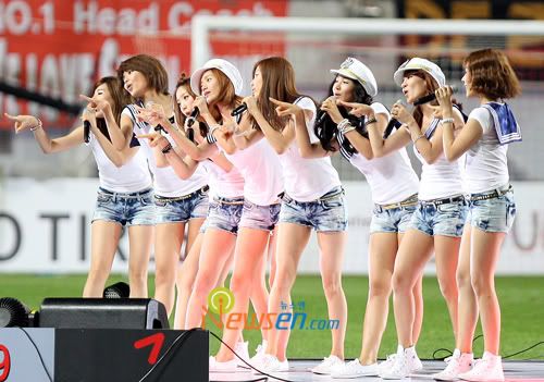 Girls Generation in their short denim shorts and cute sailor tops perform 